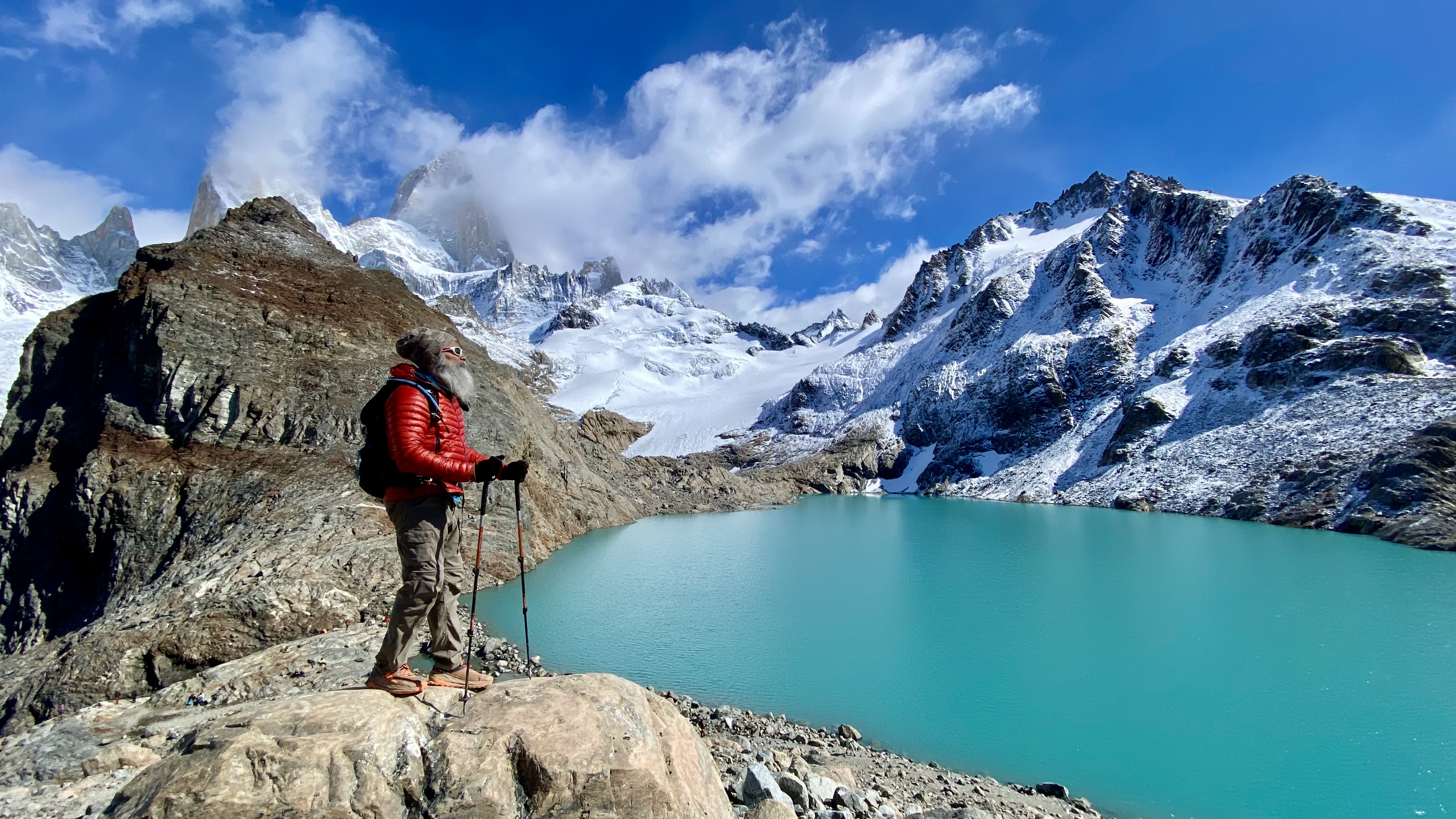 Gurpreet hiking above the turquoise lakes at Fitz Roy